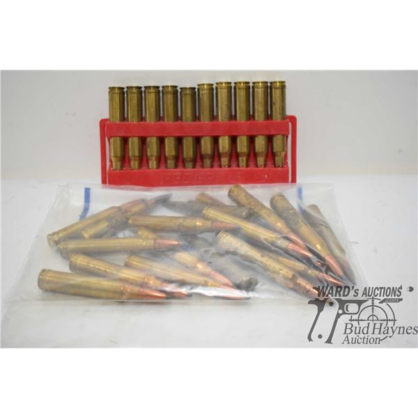 Bag w/ 30 .300 win mag reloads (2 need primers)