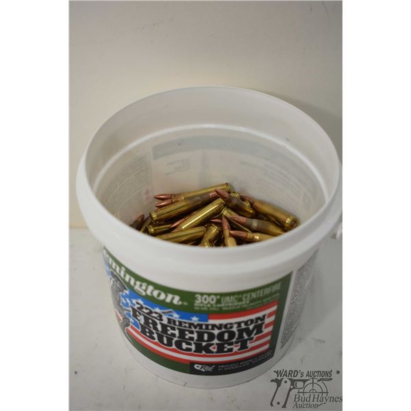 Small plastic bucket w/ 150 rounds of Remington .223 rem 55 gr FMJ