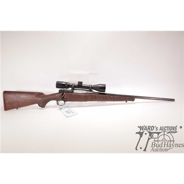 Non-Restricted rifle Winchester model 70XTR Featherweight, 257 Roberts bolt action, w/ bbl length 20