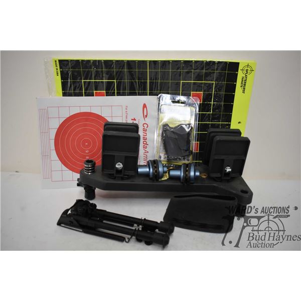 Gun grip shooting vise, bipod, speed loader, butt pad, trigger locks and a selection of targets