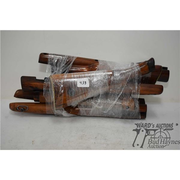 Five sets of Lee Enfield stock and forewood