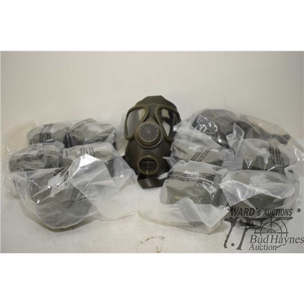 Two German gas masks and nine filters