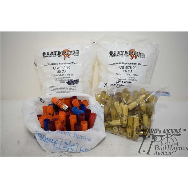 Box w/ two full 500 count boxes of 20 GA wads, bag of 77 once fired 20 GA shells and bag w/ 62 12 GA