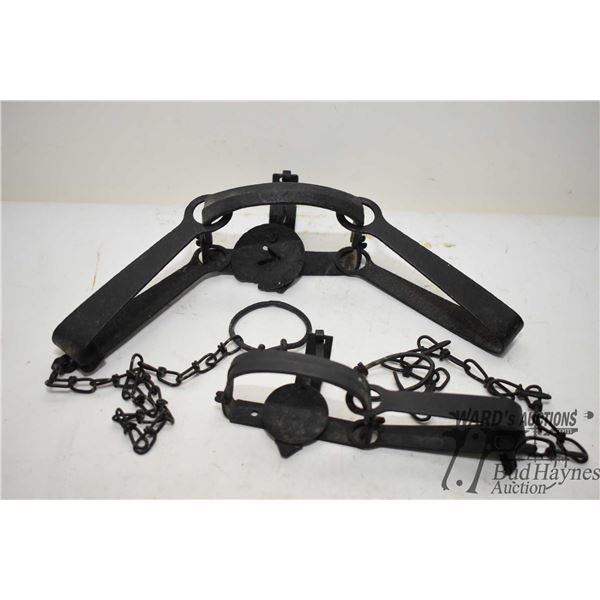 Two leg hold traps including double spring Victor Oneida and a single spring unmarked