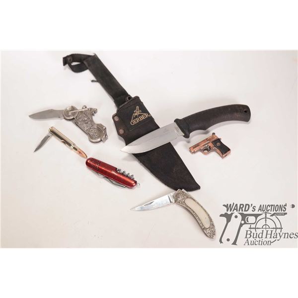 Selection of collectable knives including Gerber gator with sheath, motorbike knife, bullet knife, e