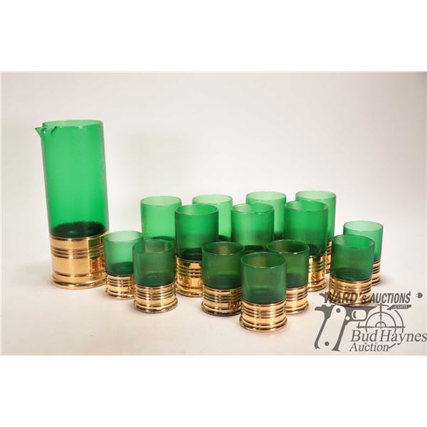 Shot shell theme decanter and drinking glasses included 7 tall and 7 short plus a framed "Shooter Li