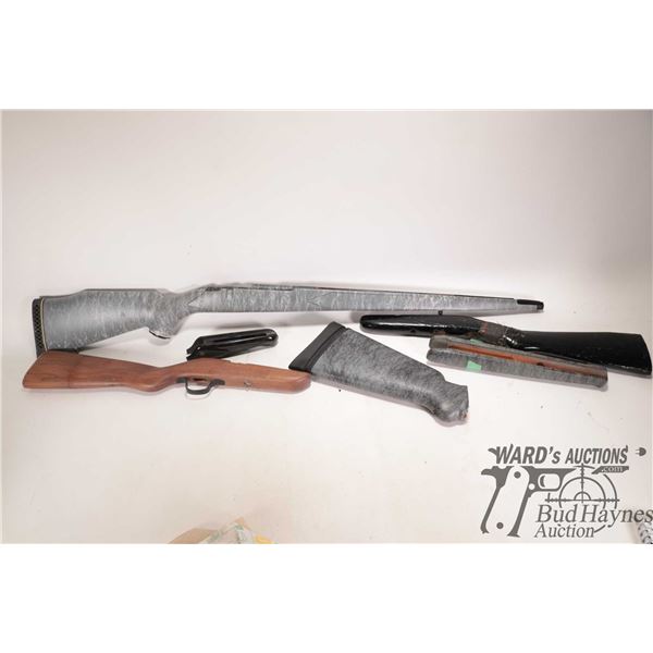 Four assorted rifle stocks