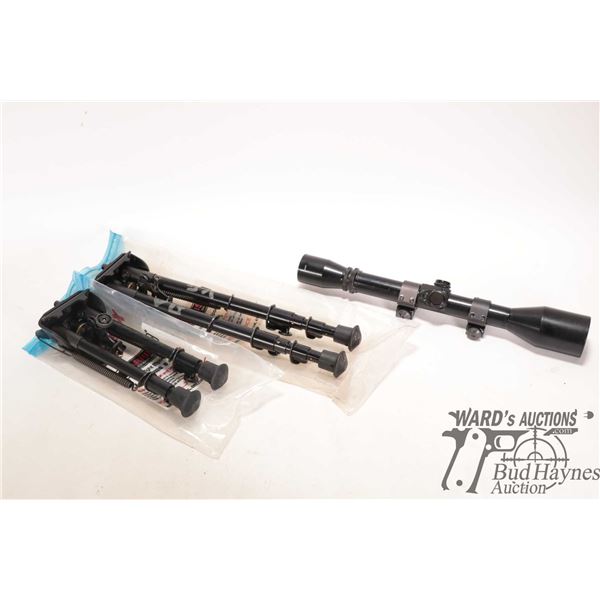 Two bipods including 8" and 12" plus a sportsman 4-9X40 scope, note: cross hairs are loose.