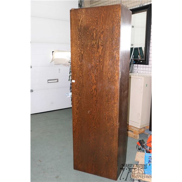 Homemade locking gun cabinet with storage shelves and portable shooting box, measures 81" H X 24" W 