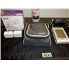 Image 1 : Box of Smart plugs, blood pressure machine