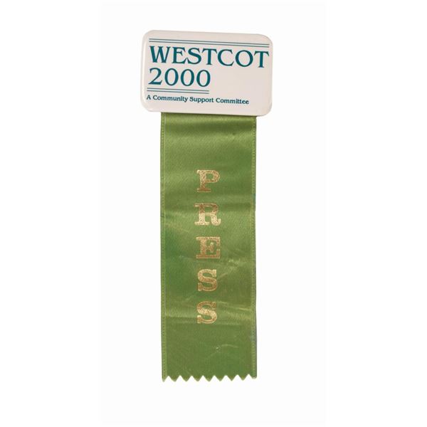 A WESTCOT 2000 Press Button with Ribbon.