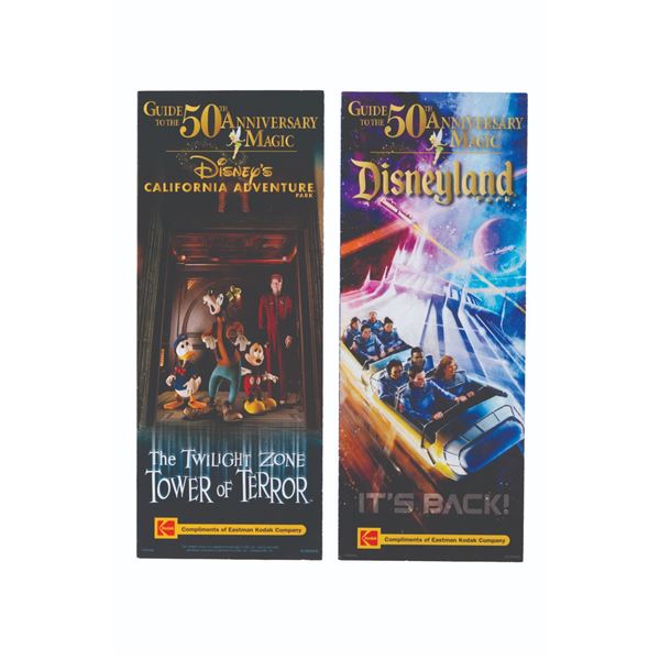 A Pair of Disneyland Resort 50th Anniversary Guides.