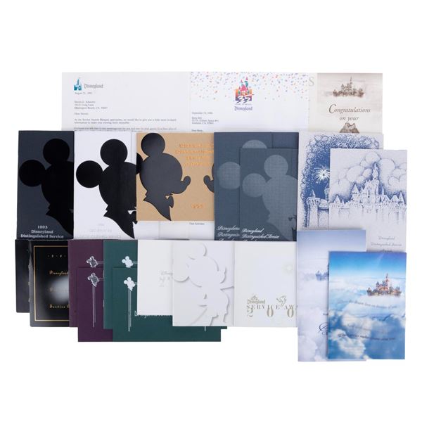 A Collection of Cast Member Service Awards Souvenirs.