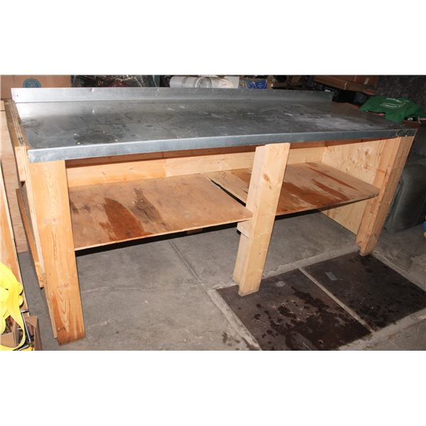 LARGE WELL BUILT SHOP TABLE WITH METAL TOP