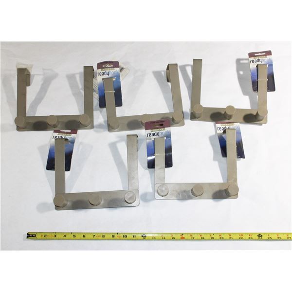 LOT OF ASSORTED OVER THE DOOR HOOKS