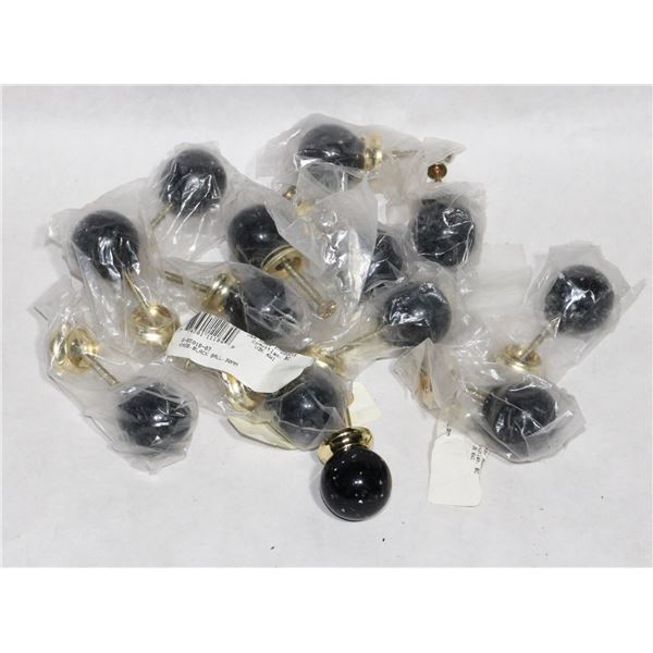 TRAY OF BLACK AND BRASS FINISH BALL CABINET KNOBS