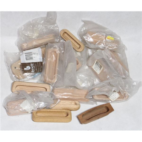 TRAY OF WOOD RECESSED CABINET PULLS