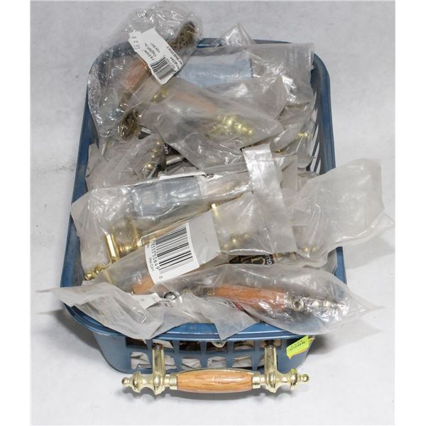 TRAY OF BRASS AND WOOD FINISH CABINET PULLS