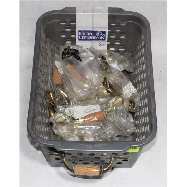 TRAY OF GOLD AND WOOD FINISH CABINET PULLS