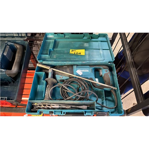 MAKITA ELECTRIC ROTARY HAMMER IN A HARD TRANSPORT CASE