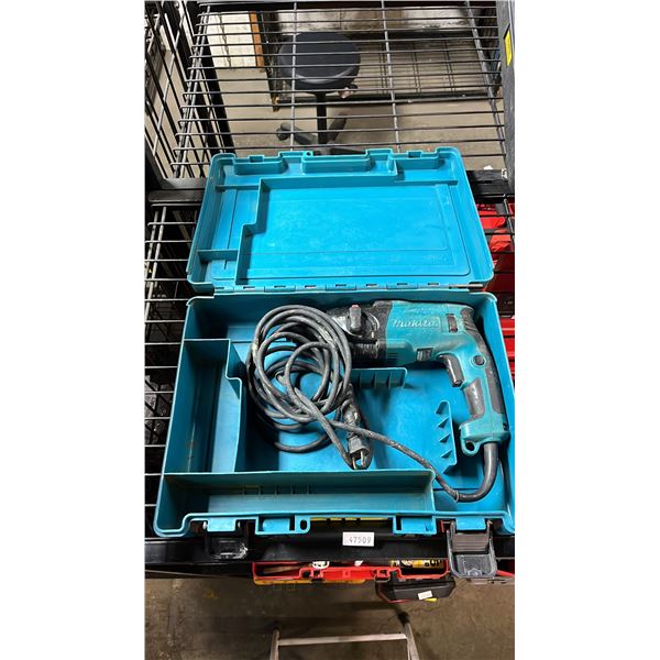 MAKITA ELECTRIC ROTARY HAMMER IN A HARD TRANSPORT CASE