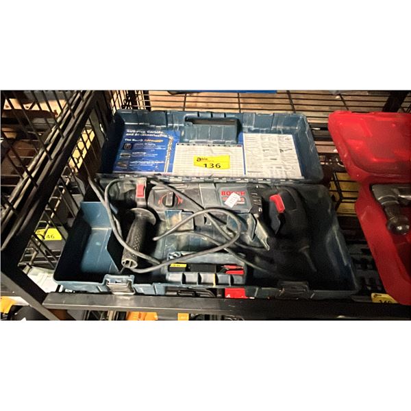 BOSCH BULLDOG XTREME VARIABLE SPEED ELECTRIC ROTARY HAMMER IN A HARD TRANSPORT CASE