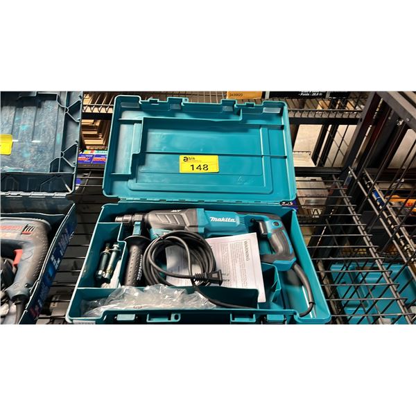 MAKITA ELECTRIC ROTARY HAMMER IN A HARD TRANSPORT CASE