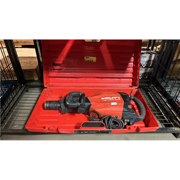 HILTI TE 1000-AVR ELECTRIC DEMOLITION HAMMER IN A HARD TRANSPORT CASE
