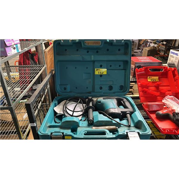 MAKITA ELECTRIC ROTARY HAMMER IN A HARD TRANSPORT CASE