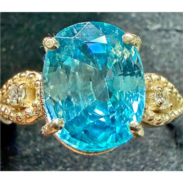 10K (2.6G)  BLUE ZIRCON (4.3CT) DIAMOND (0.03CT) RING (SIZE 7.5)  SUGGESTED RETAIL VALUE $3600