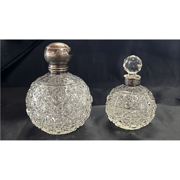 PAIR OF ANTIQUE CUT GLASS & SILVER SCENT BOTTLES - SMALLER ONE HAS A CHIPPED STOPPER