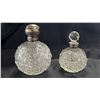 Image 1 : PAIR OF ANTIQUE CUT GLASS & SILVER SCENT BOTTLES - SMALLER ONE HAS A CHIPPED STOPPER