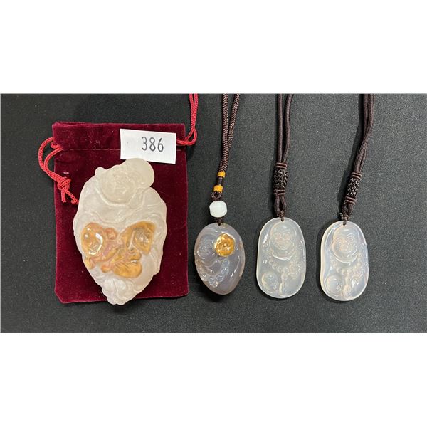 SMILING BUDDHA CARVING WITH VELVET BAG & (3) SMILING BUDDHA PENDANTS