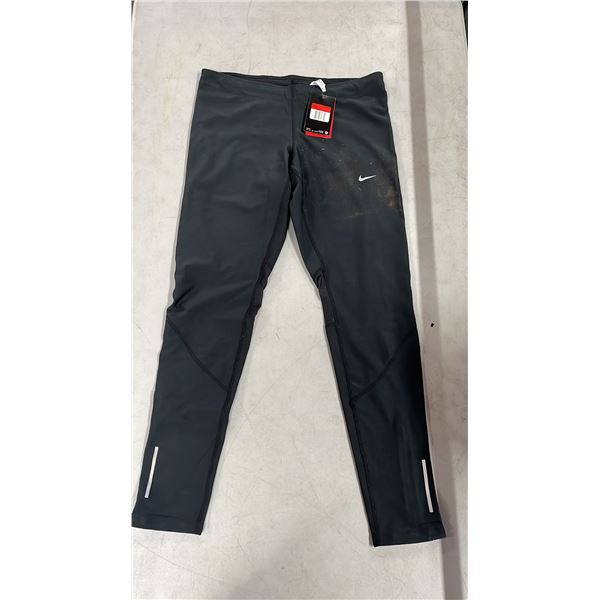 NIKE RUNNERS TIGHTS LADIES SIZE L. NEW WITH TAGS