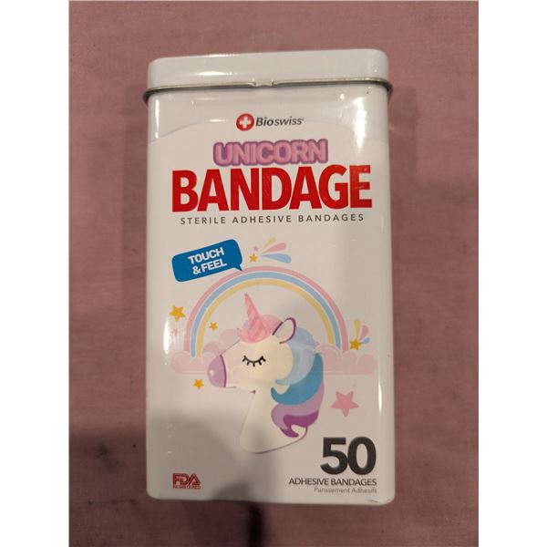 Unicorn bandaids in tin