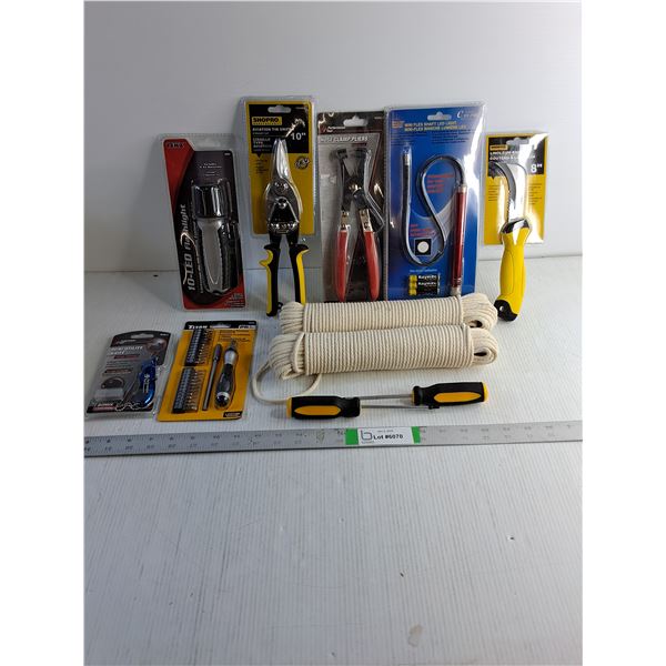 Linoleum Knife,Tin Snips,Hose Clamp Pliers,Flashlight,(2) Rolls of Rope and more as pictured