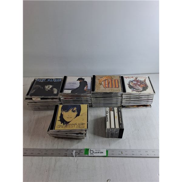 (48) CDs/ (4) Cassettes