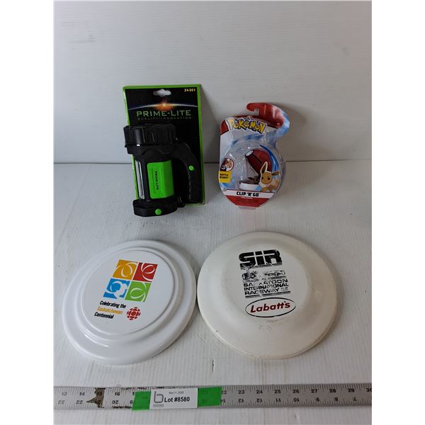 (2) Frisbees, Flashlight- Powers On, Pokemon Clip n Go- Sealed