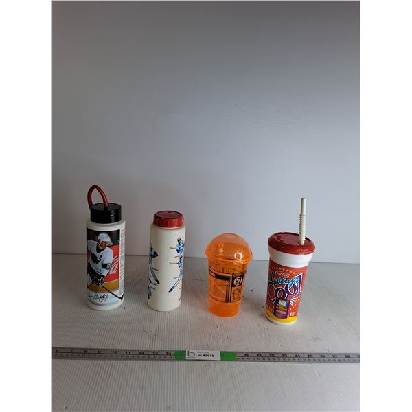 (4) Plastic Bottles Up To 10"