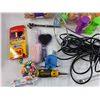 Image 5 : Ethernet Cable, Ratchet Wrench, 14mm Wrench, Hair Brushes, Easter Eggs, Bubbles, Misc