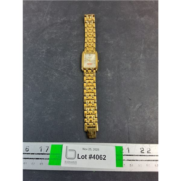 (1) Gold Tone Bulova Classic Watch-Rectangular Dial,Diamond Accent and Custom "Sangsters Health Cent