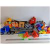 Image 1 : Box Of Assorted Plastic Toys - Trucks, Blocks , Baseball Mitt, Vtech Train Powers On