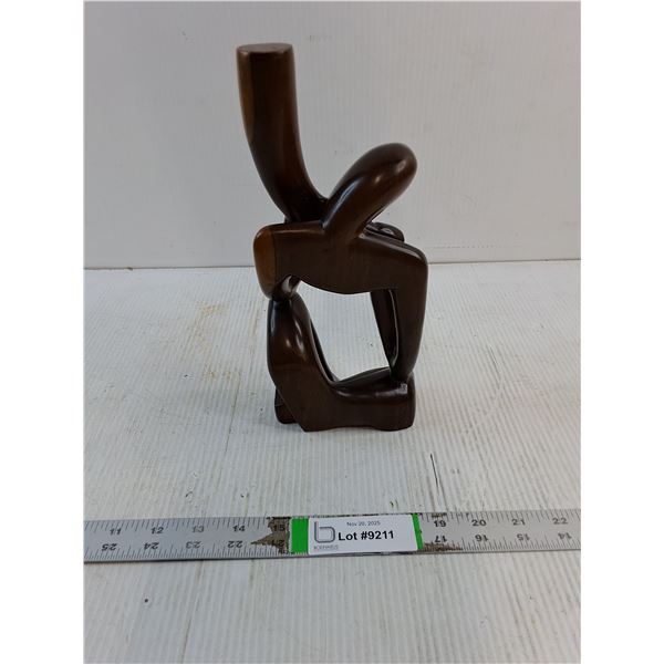 African Wood Sculpture-Crouching Man Playing Horn