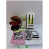Image 1 : Mountie Teddy Bear, Cooling Rods, Doll, Magnets, Picture Frame, Calligraphy Pen Set