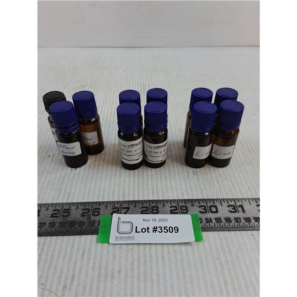 (11) 20 ml Bottles of Essential Oils (4-Lemon, 4-Lime, 3-Strawberry) - 9 Sealed - Cannot Ship