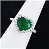 Image 1 : 2.90 ctw Heart Shaped Emerald and 0.63 ctw Diamond 18K White Gold Ring