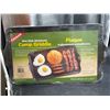 Image 2 : Coghlan’s Non-Stick Aluminum Camp Griddle, 10 x 16.5 Inches