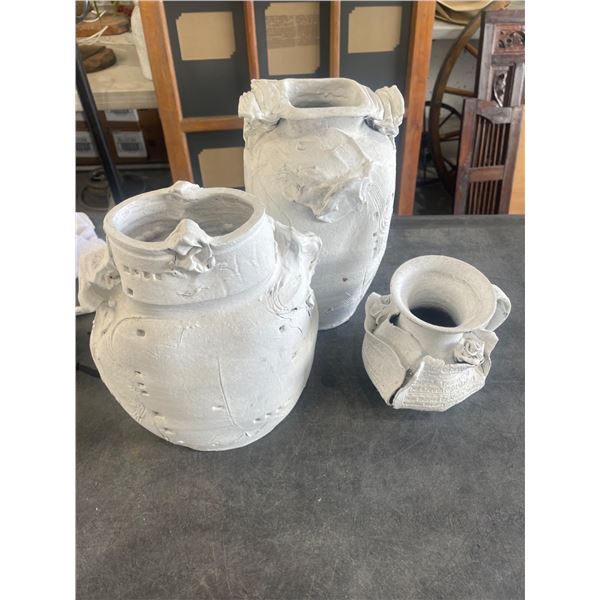 Three Sculptural Clay Vases In White Tones