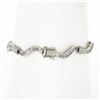 Image 2 : 18K Gold 7" 1.60 ctw Baguette Channel Set Diamond Dual Finish Wavy Link Bracelet