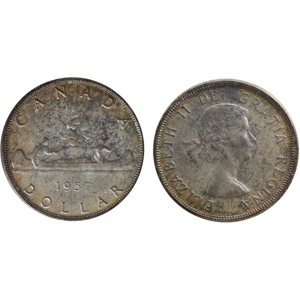 1957 $1 "1 WL" ICCS Gem Mint State-65 Delicate russet and silver grey tones over full underlying lus